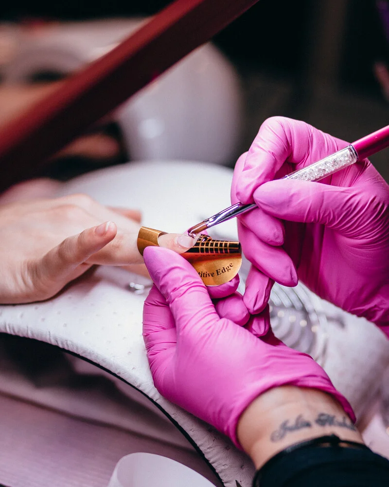 Nail technician giving a manicure